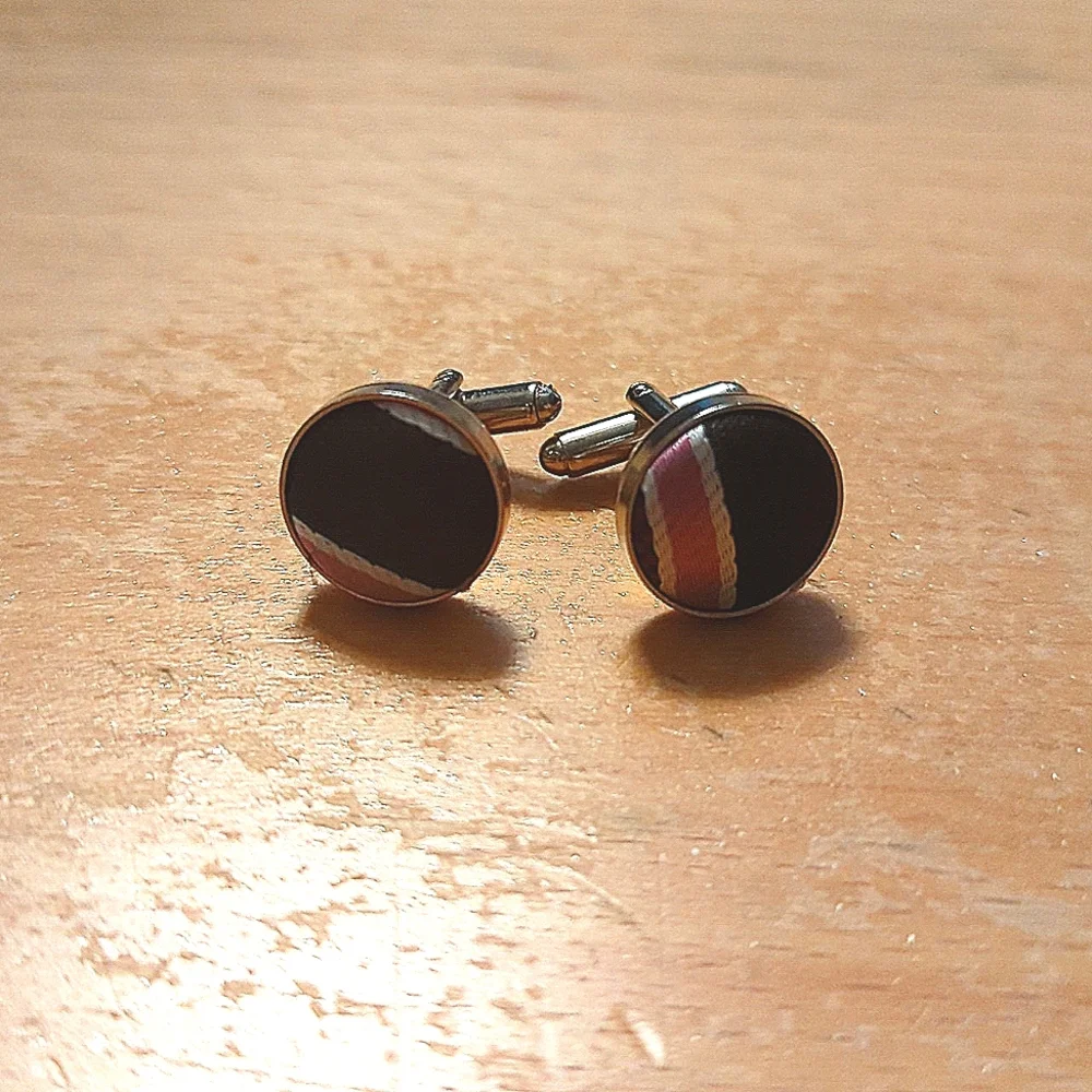 Cuff links with pocket square in a box